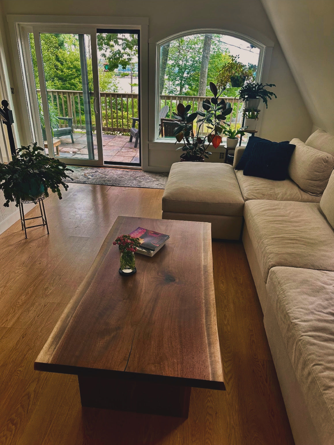 Custom live edge walnut coffee table by Garage Mills in a client living room