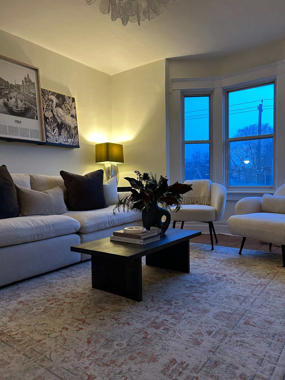 Black solid wood coffee table by Garage Mills in a finished living room
