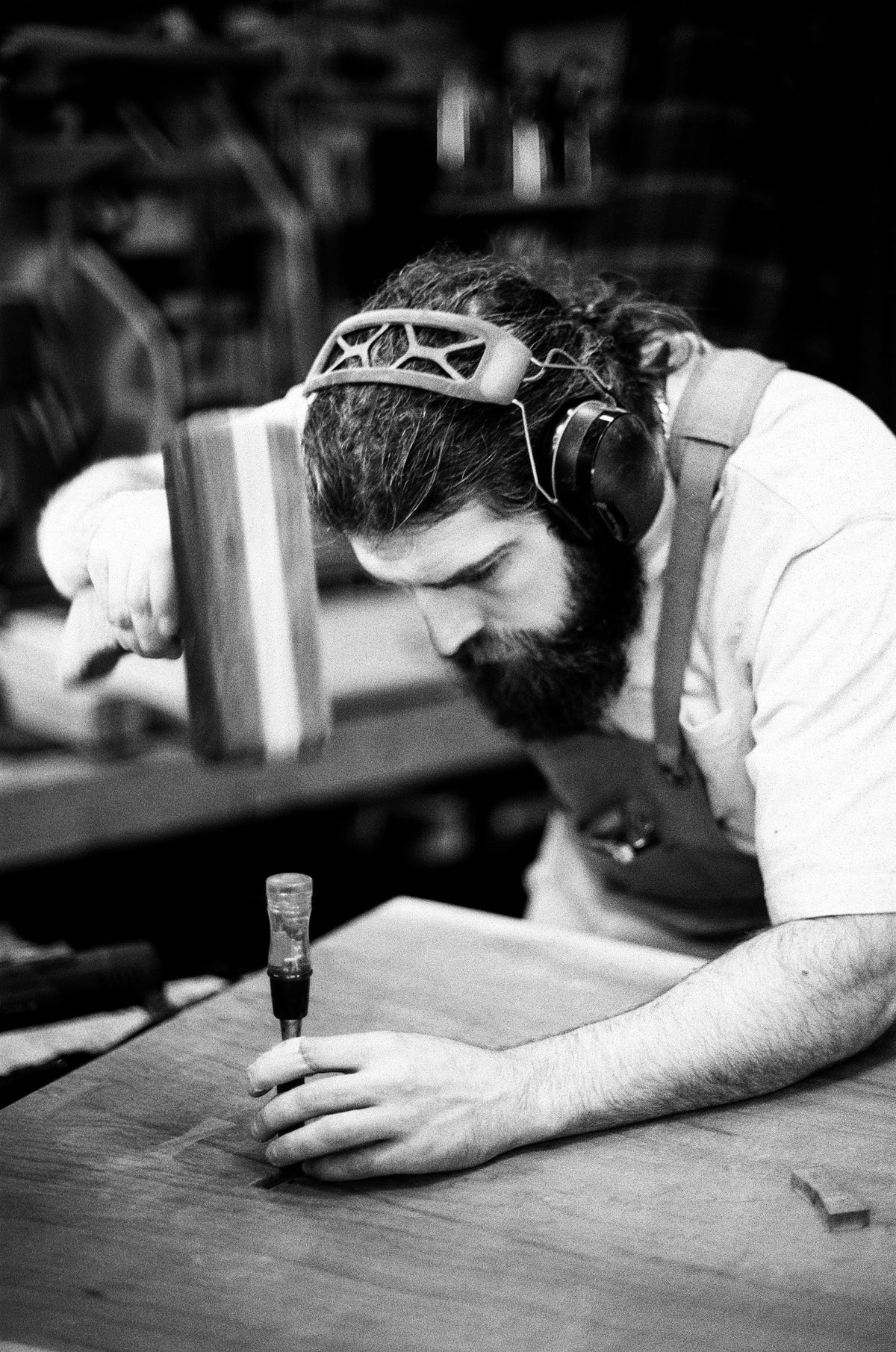 Garage Mills furniture maker working by hand in the Toronto workshop