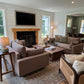 Garage Mills walnut live edge coffee table in a warm furnished living room