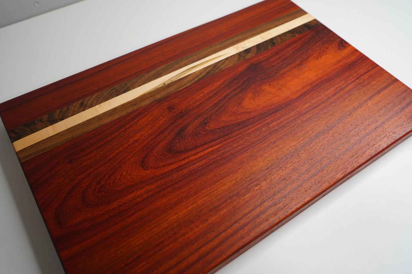 Padauk, Walnut, and Maple Cutting Board